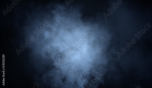 Cuadros en Lienzo Blue fog and misty effect on black background