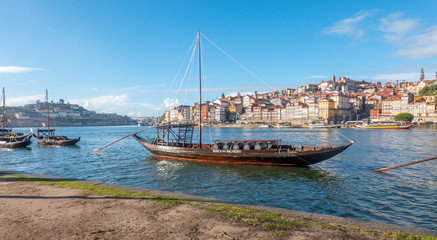 Wall Mural - douro river view with boats in porto portugal