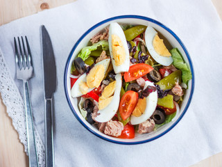 Wall Mural - Nicoise salad with tuna, green beans, basil and fresh vegetables