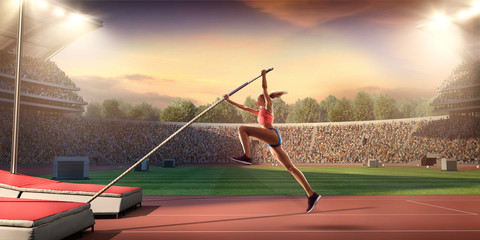 Wall Mural - Young female pole vault athlete with pole bar. Women in sport clothes at athletic sport track in professional stadium