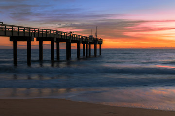 Sunrise over the Atlantic Ocean at the St. Augustine Beach Pier in St. Augustine, Florida