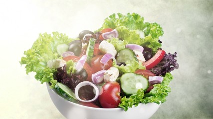 Wall Mural - Close-up photo of fresh salad with vegetables in white plate