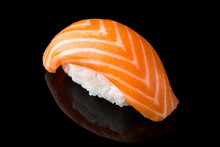 Delicious Sushi Nigiri With Salmon (Sake) On Black Background. Traditional Japanese Cuisine