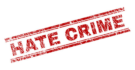 Wall Mural - hate crime seal print with distress texture. red vector rubber print of hate crime caption with dust