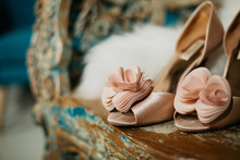  Beautiful Picture For A Wedding Article Or Wedding Site. Bride's Shoes And Cape On A Wooden Chair.