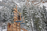 Fototapeta Na ścianę - Winter Construction in the Mountains