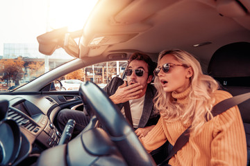 Couple traveling in a car