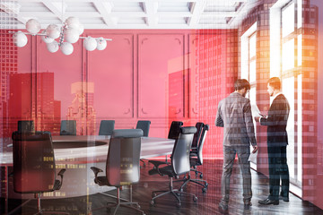 Canvas Print - Red meeting room interior, people