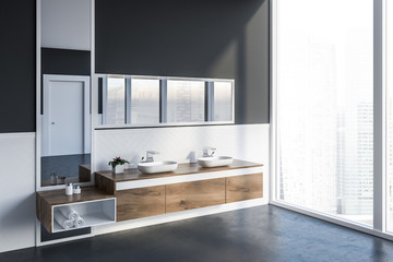 Side view of gray bathroom with double sink