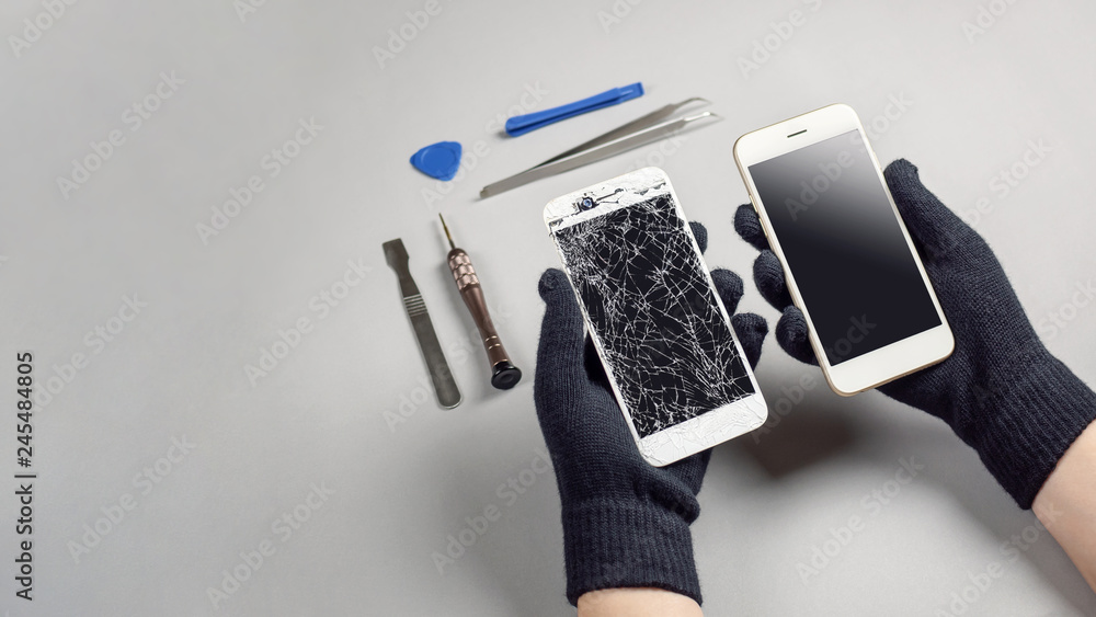 Technician or engineer prepairing to repair and replace new screen broken and cracked screen smartphone prepairing on desk with copy space - obrazy, fototapety, plakaty 