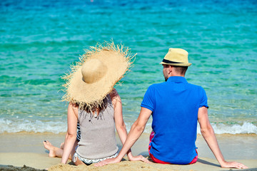 Couple on beach in Greece