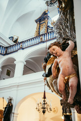 Wall Mural - Angel sculpture in a baroque church