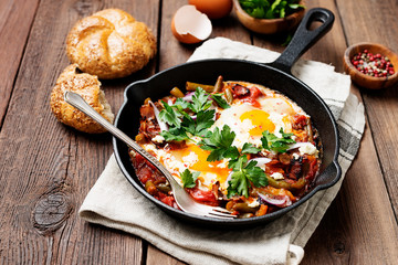 Wall Mural - Shakshuka, Fried Eggs in Tomato Sauce for breakfast.