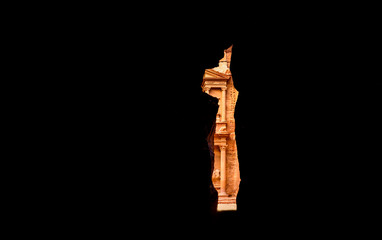 Wall Mural - The beautiful Al Khazneh (The Treasury) seen through a canyon's walls in Petra. Petra is a historical and archaeological city in southern Jordan.