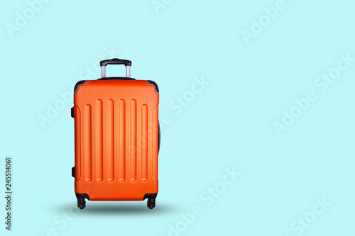 Cuadros en Lienzo Travel suitcase on blue background