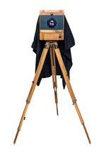 Old Wooden Camera On A Tripod Isolated On White Background