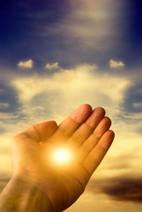 Wall Mural - hand with divine angel light like concept of hope and god love