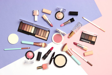 Wall Mural - professional makeup tools. Makeup products on a colored background top view. A set of various products for makeup.