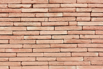 Wall Mural - Brown brick wall as a background or texture