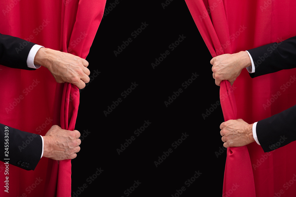 Two Men Opening Red Curtain Stock Photo | Adobe Stock