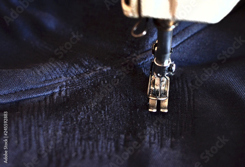 dark blue jeans with gold stitching