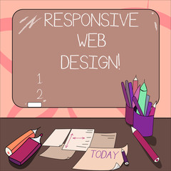Writing note showing Responsive Web Design. Business photo showcasing web page creation that makes use of flexible layouts Mounted Blackboard with Chalk Writing Tools Sheets on Desk