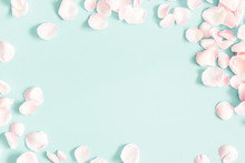 Flowers Composition. Rose Flower Petals On Pastel Blue Background. Valentine's Day, Mother's Day Concept. Flat Lay, Top View, Copy Space