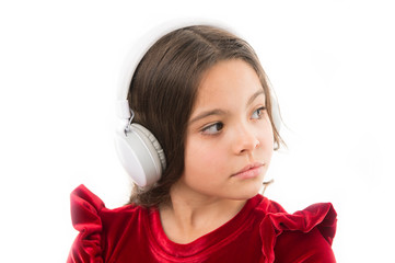 Wall Mural - Music is so much fun. small girl in red dress. childhood and happiness. small child in headphones. music. listening ebook. audio education. kid fashion and beauty. happy childrens day