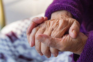 Close-up Of wrinkly hands of elderly woman.