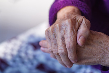 Close-up Of wrinkly hands of elderly woman.