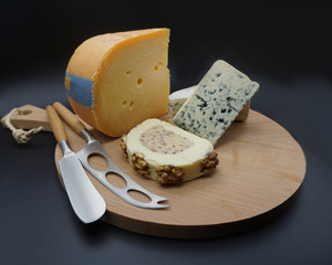 cheese selection on wooden rustic board. Various types of international cheese, blue mold, gouda, gorgonzola . top view - Image. 