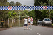 Police tape blocks street, Brisbane Floods 2011