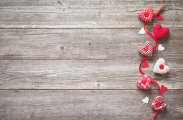 valentines day background with handmade textile hearts