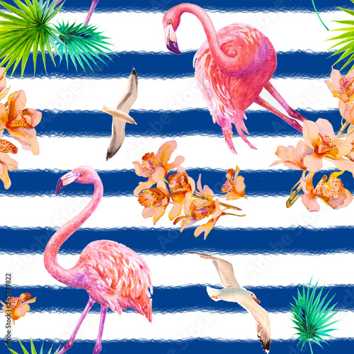 Tropical summer arrangements with flamingos, palm leaves and exotic orchids f...