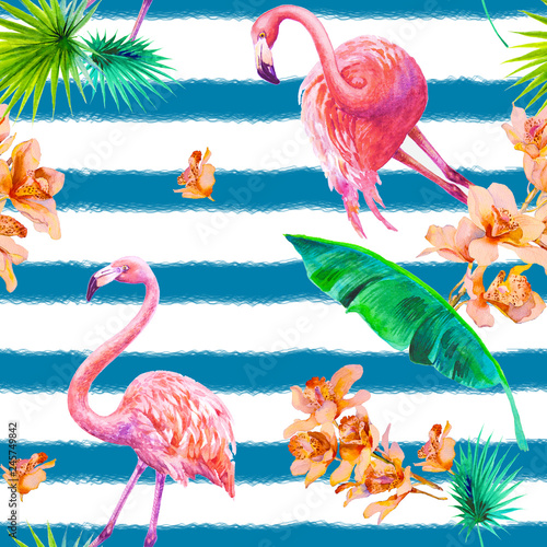 Tropical summer arrangements with flamingos, palm leaves and exotic orchids f...