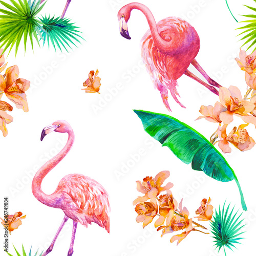 Tropical summer arrangements with flamingos, palm leaves and exotic orchids f...
