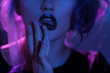 © Svyatoslav Lypynskyy - Makeup with red lips. Touching red lips