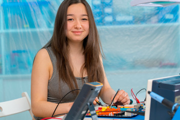 Sticker - schoolgirl  in electronics class