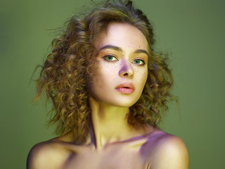 Wall Mural - Beautiful woman in color Light. amazing curly girl