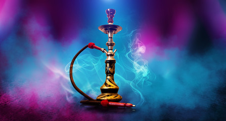 Poster - Smoking hookah on the background of an empty room. Multicolored neon light. Searchlight, laser blue and pink rays, smoke.