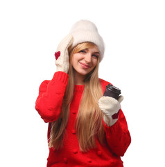 Canvas Print - Portrait of young woman in stylish hat and sweater with paper coffee cup on white background. Winter atmosphere