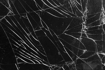 Broken glass on a black background, object background design texture