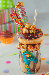 Wall Mural - Freak shake topping with chocolate donut and sweets