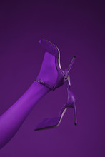 Sexy Heel. Purple Violet Shoes For Women. Shoe Shop. Women's Accessories. Beautiful Legs Of Woman And High Heel Shoes. Ultraviolet. Summer Sandals On Pastel Backgrounds. Fashion Style Minimalism Set