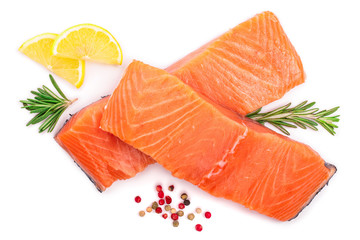 Wall Mural - fillet of red fish salmon with lemon and rosemary isolated on white background. Top view. Flat lay