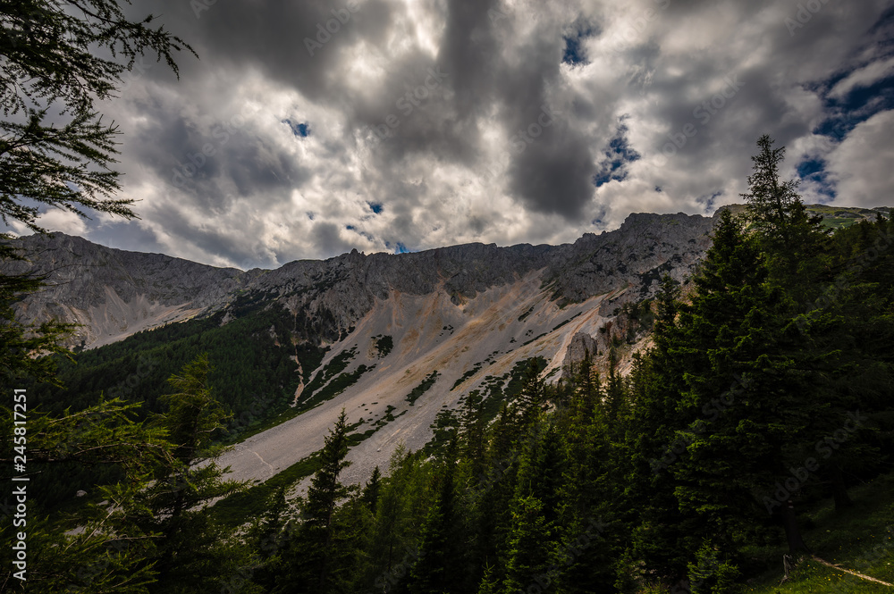 Magnificent view on Krummeries, rubble field with dramatic, cloudy sky ...