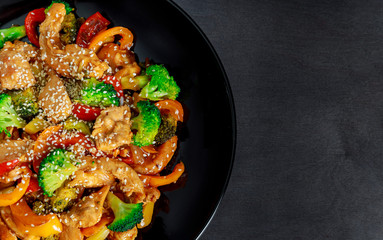 Chicken and broccoli with spicy sesame teriyaki sauce.