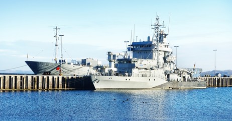 Canvas Print - Moored military ships on a pier in Kiel