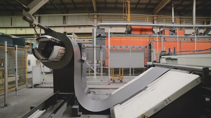 Wall Mural - Roller forming machine. The interior of the plant producing a metal profile.