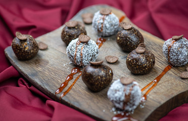 Wall Mural - Healthy raw energy balls with cocoa, coconut, nuts